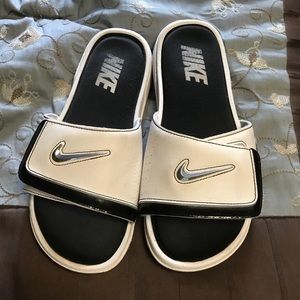 Nike slides.